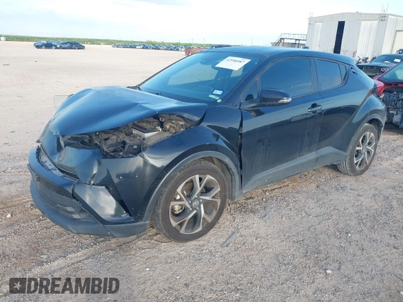 2018 Toyota C-HR XLE with VIN JTNKHMBX6J1007058, listed as a IAAI auction lot 42100587 with 71,725 mi miles and . Bid and sale history available at DreamBid. Image 2.