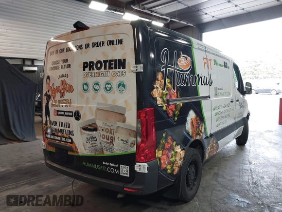 2023 Mercedes-Benz Sprinter Cargo Cargo with VIN W1Y40BHY5PT157048, listed as a IAAI auction lot 40339280 with 33,725 mi miles and . Bid and sale history available at DreamBid. Image 4.