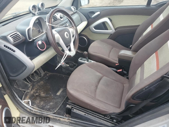2009 Smart fortwo Pure z VIN WMEEJ31X49K292142, wystawiony jako Copart lot #48928535 z przebiegiem 226 263 mil mil oraz Tytuł czysty. Historia ofert i sprzedaży dostępna na DreamBid. Obrazek 7.