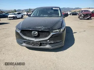 2018 Mazda CX-5 Grand Touring с VIN JM3KFADM2J1310339, выставлен на аукционе Copart как лот 64705245 с пробегом 63 927 миль миль и Списание • Salvage title. История ставок и продаж доступна на DreamBid. Изображение 15.