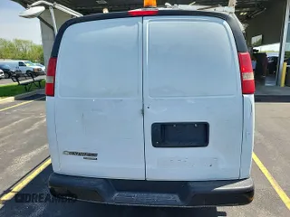 2012 Chevrolet Express Cargo Van with VIN 1GCWGFCA0C1178728, listed as a IAAI auction lot 42132184 with 148,560 mi miles. Bid and sale history available at carsss.com. Image 1.