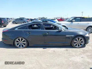 2015 Jaguar XJ R-Sport with VIN SAJWJ1CD6F8V83990, listed as a IAAI auction lot 41936162 with Not Provided miles and . Bid and sale history available at DreamBid. Image 13.