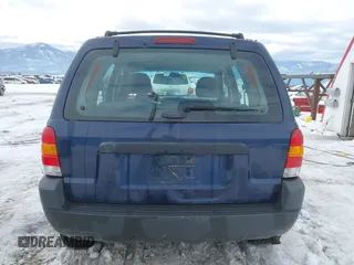 2003 Ford Escape XLS Popular with VIN 1FMYU92153KE01890, listed as a IAAI auction lot 41605087 with 109,411 mi miles. Bid and sale history available at carsss.com. Image 17.
