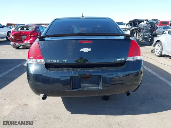 2013 Chevrolet Impala LTZ with VIN 2G1WC5E3XD1208357, listed as a IAAI auction lot 42053811 with 376,518 mi miles. Bid and sale history available at carsss.com. Image 16.