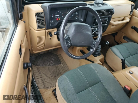 1998 Jeep Wrangler Sahara with VIN 1J4FY49S2WP707318, listed as a Copart auction lot 59508635 with 144,948 mi miles and Clean title. Bid and sale history available at DreamBid. Image 8.