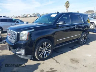 2019 GMC Yukon Denali with VIN 1GKS2CKJ4KR191886, listed as a IAAI auction lot 41198227 with 74,325 mi miles. Bid and sale history available at carsss.com. Image 17.