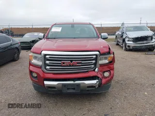 2015 GMC Canyon 2WD SLT with VIN 1GTG5CE3XF1211164, listed as a IAAI auction lot 41490387 with 163,932 mi miles. Bid and sale history available at carsss.com. Image 12.
