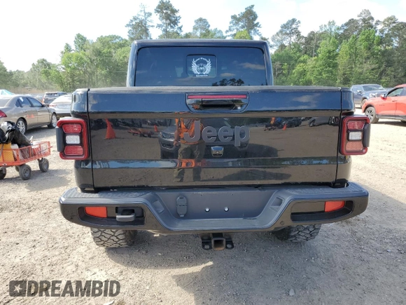 2023 Jeep Gladiator High Altitude z VIN 1C6HJTFG1PL591347, wystawiony jako Copart lot #52847825 z przebiegiem 9 854 mil mil oraz Szkoda całkowita • Salvage title. Historia ofert i sprzedaży dostępna na DreamBid. Obrazek 6.