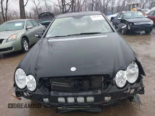 2007 Mercedes-Benz CLK-Class 5.5L with VIN WDBTJ72H77F214706, listed as a IAAI auction lot 41471332 with 87,310 mi miles. Bid and sale history available at carsss.com. Image 13.