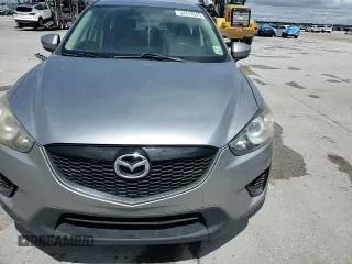 2014 Mazda CX-5 Sport with VIN JM3KE2BE1E0402185, listed as a Copart auction lot 52313675 with 140,398 mi miles and Salvage Title. Bid and sale history available at carsss.com. Image 12.