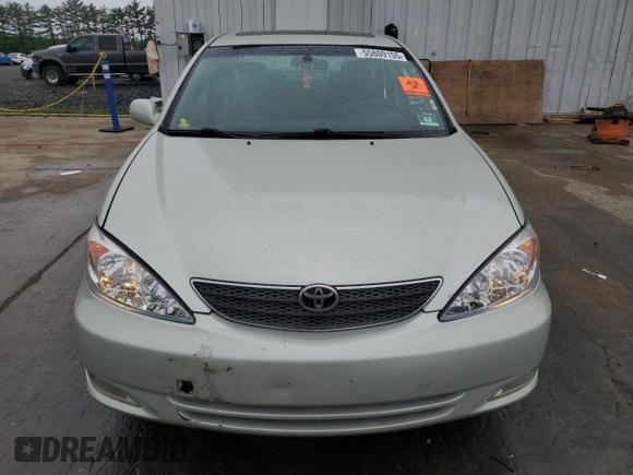 2004 Toyota Camry LE z VIN JTDBE32K940297754, wystawiony jako Copart lot #55809155 z przebiegiem 232 092 mil mil oraz Szkoda całkowita • Salvage title. Historia ofert i sprzedaży dostępna na DreamBid. Obrazek 5.