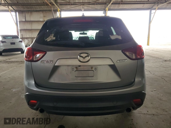 2014 Mazda CX-5 Touring z VIN JM3KE2CY7E0349484, wystawiony jako Copart lot #51188665 z przebiegiem 175 131 mil mil oraz Szkoda całkowita • Salvage title. Historia ofert i sprzedaży dostępna na DreamBid. Obrazek 6.