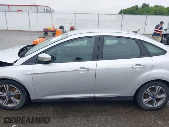 2017 Ford Focus SE with VIN 1FADP3FEXHL283329, listed as a IAAI auction lot 42347751 with 85,337 mi miles and . Bid and sale history available at DreamBid. Image 15.