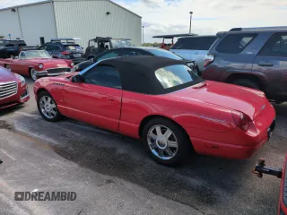 2004 Ford Thunderbird Deluxe z VIN 1FAHP60A84Y102847, wystawiony jako Copart lot #75357864 z przebiegiem Nie podano mil oraz Szkoda całkowita • Salvage title. Historia ofert i sprzedaży dostępna na DreamBid. Obrazek 2.