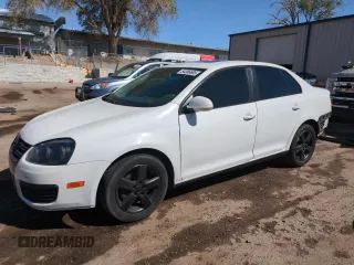 2009 Volkswagen Jetta SE with VIN 3VWRZ71K09M130230, listed as a Copart auction lot 54366605 with 143,655 mi miles and Salvage title. Bid and sale history available at DreamBid. Image 1.