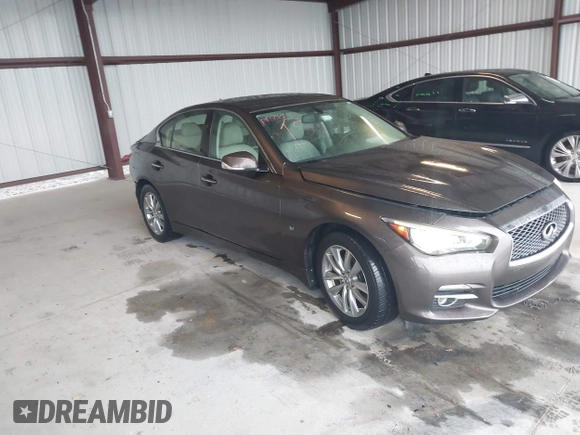 2015 Infiniti Q50 Premium z VIN JN1BV7AR0FM393387, wystawiony jako IAAI lot #42257850 z przebiegiem 176 436 mil mil oraz . Historia ofert i sprzedaży dostępna na DreamBid. Obrazek 1.