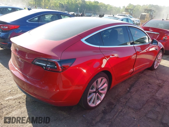 2018 Tesla Model 3 Long Range Battery with VIN 5YJ3E1EA5JF063555, listed as a IAAI auction lot 42028785 with 45,346 mi miles and . Bid and sale history available at DreamBid. Image 4.