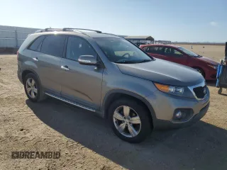 2012 Kia Sorento EX with VIN 5XYKU4A6XCG277986, listed as a Copart auction lot 51830365 with 142,201 mi miles and Clean Title. Bid and sale history available at carsss.com. Image 4.