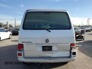 2003 Volkswagen EuroVan MV с VIN WV2NB47043H011247, выставлен на аукционе Copart как лот 85056064 с пробегом 190 282 миль миль и Списание • Salvage title. История ставок и продаж доступна на DreamBid. Изображение 6.
