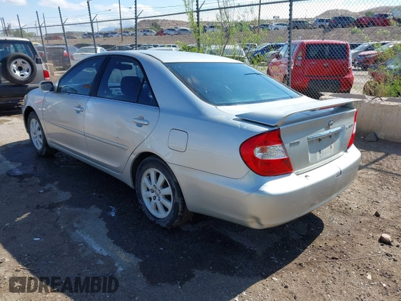 2003 Toyota Camry LE with VIN 4T1BE30K63U769219, listed as a IAAI auction lot 42178777 with 293,769 mi miles and . Bid and sale history available at DreamBid. Image 3.