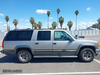 1999 GMC Suburban with VIN 3GKFK16R0XG511301, listed as a IAAI auction lot 41946753 with 231,650 mi miles. Bid and sale history available at carsss.com. Image 13.