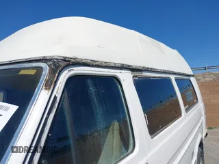 1985 Ford Econoline Cargo with VIN 1FBHS31L3FHA83624, listed as a IAAI auction lot 41987555 with 2,242 mi miles and . Bid and sale history available at DreamBid. Image 12.
