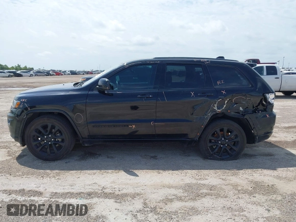 2019 Jeep Grand Cherokee Altitude with VIN 1C4RJEAG0KC857787, listed as a IAAI auction lot 42434646 with 193,968 mi miles and . Bid and sale history available at DreamBid. Image 14.
