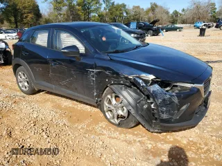 2021 Mazda CX-3 Sport with VIN JM1DKDB78M1515924, listed as a Copart auction lot 43688325 with 56,271 mi miles and Salvage Title. Bid and sale history available at carsss.com. Image 4.