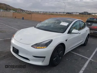 2022 Tesla Model 3 with VIN 5YJ3E1EA9NF375335, listed as a IAAI auction lot 41676024 with 18,836 mi miles. Bid and sale history available at carsss.com. Image 2.