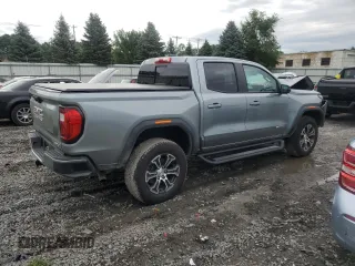 2023 GMC Canyon 4WD AT4 with VIN 1GTP6DEK4P1124937, listed as a Copart auction lot 66103474 with 10,566 mi miles and Salvage Title. Bid and sale history available at carsss.com. Image 3.