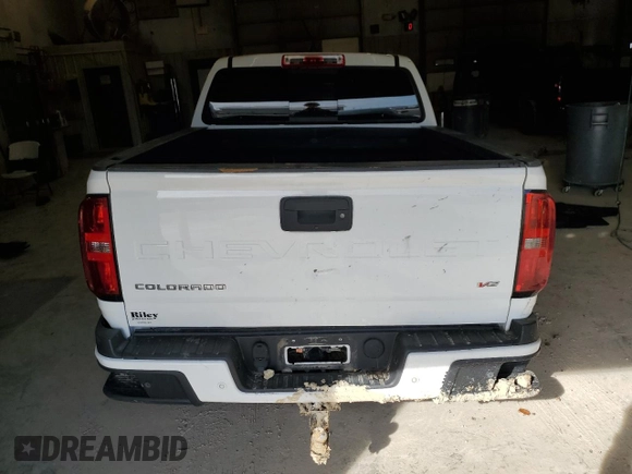 2021 Chevrolet Colorado 4WD Z71 with VIN 1GCGTDEN4M1214359, listed as a Copart auction lot 47929185 with 77,084 mi miles and Salvage title. Bid and sale history available at DreamBid. Image 6.