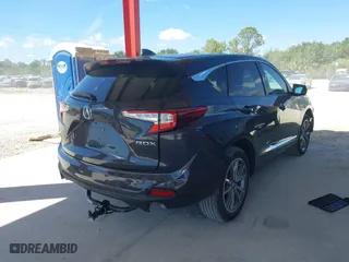 2021 Acura RDX w/Technology Package with VIN 5J8TC1H54ML016041, listed as a IAAI auction lot 41855161 with 33,876 mi miles. Bid and sale history available at carsss.com. Image 4.