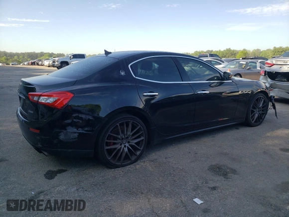 2016 Maserati Ghibli S с VIN ZAM57RSA2G1181033, выставлен на аукционе Copart как лот 52780575 с пробегом 105 266 миль миль и Списание • Salvage title. История ставок и продаж доступна на DreamBid. Изображение 3.