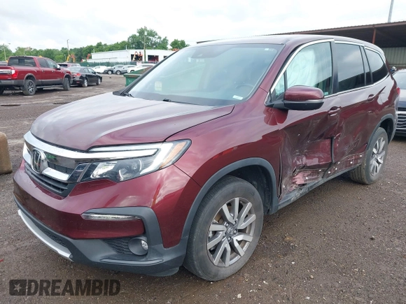 2021 Honda Pilot EX-L with VIN 5FNYF6H53MB094015, listed as a IAAI auction lot 42545722 with 66,065 mi miles and . Bid and sale history available at DreamBid. Image 2.