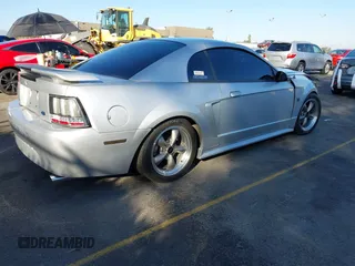 2004 Ford Mustang Standard with VIN 1FAFP40434F100991, listed as a IAAI auction lot 40706520 with 93,130 mi miles. Bid and sale history available at carsss.com. Image 4.