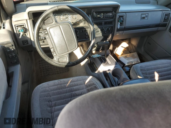 1994 Jeep Grand Cherokee Laredo with VIN 1J4GZ58S8RC254097, listed as a Copart auction lot 47379645 with 240,739 mi miles and Salvage Title. Bid and sale history available at carsss.com. Image 8.