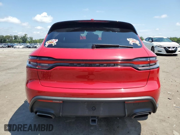 2023 Porsche Macan with VIN WP1AA2A54PLB07597, listed as a Copart auction lot 64077345 with 50,704 mi miles and Salvage title. Bid and sale history available at DreamBid. Image 6.