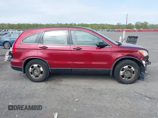 2007 Honda CR-V LX with VIN JHLRE38327C040004, listed as a IAAI auction lot 42084244 with 271,363 mi miles. Bid and sale history available at carsss.com. Image 14.