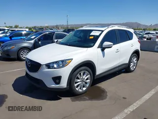 2015 Mazda CX-5 Grand Touring with VIN JM3KE2DYXF0493370, listed as a IAAI auction lot 42087156 with 161,464 mi miles. Bid and sale history available at carsss.com. Image 17.