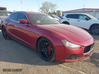 2014 Maserati Ghibli S Q4 with VIN ZAM57RTA1E1126505, listed as a IAAI auction lot 42115267 with 90,760 mi miles. Bid and sale history available at carsss.com. Image 1.