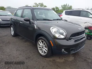 2015 MINI Countryman S with VIN WMWZC3C5XFWT06746, listed as a IAAI auction lot 42439497 with 59,462 mi miles and . Bid and sale history available at DreamBid. Image 1.