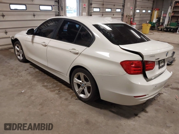 2014 BMW 3 Series 320i xDrive with VIN WBA3C3C52EPV90601, listed as a IAAI auction lot 42082100 with 1 mi miles. Bid and sale history available at carsss.com. Image 3.