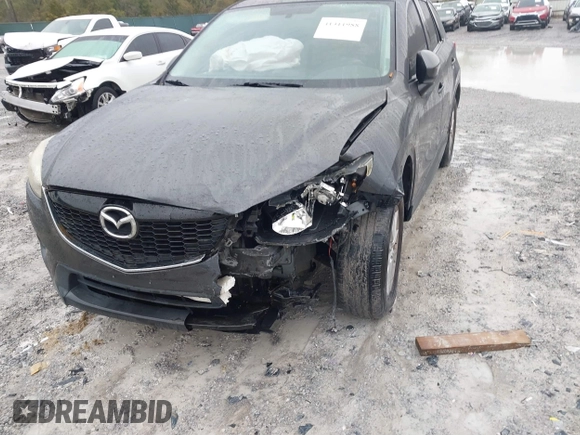 2015 Mazda CX-5 Touring with VIN JM3KE2CY4F0435563, listed as a IAAI auction lot 41311988 with 187,183 mi miles. Bid and sale history available at carsss.com. Image 6.