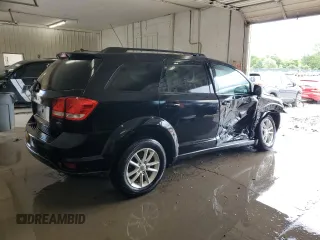 2015 Dodge Journey SXT with VIN 3C4PDDBG7FT646152, listed as a Copart auction lot 58371505 with 143,759 mi miles and Salvage title. Bid and sale history available at DreamBid. Image 3.