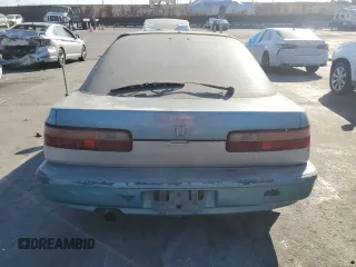 1990 Acura Integra with VIN JH4DA9358LS053319, listed as a Copart auction lot 80949884 with 42,570 mi miles and Salvage title. Bid and sale history available at DreamBid. Image 6.