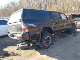 2011 Toyota Tacoma with VIN 3TMLU4EN4BM058738, listed as a IAAI auction lot 41646897 with 117,817 mi miles and . Bid and sale history available at DreamBid. Image 4.