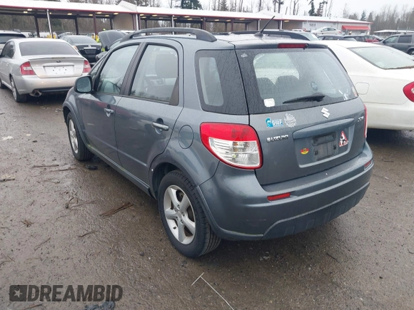 2008 Suzuki SX4 Regional Edition Touring with VIN JS2YA413285102839, listed as a IAAI auction lot 41473669 with 102,914 mi miles. Bid and sale history available at carsss.com. Image 3.
