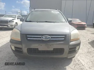 2005 Kia Sportage LX with VIN KNDJE723757076660, listed as a Copart auction lot 86119444 with 106,000 mi miles and Clean Title. Bid and sale history available at carsss.com. Image 5.