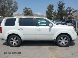 2013 Honda Pilot Touring with VIN 5FNYF3H93DB017954, listed as a IAAI auction lot 42185556 with 174,929 mi miles and . Bid and sale history available at carsss.com. Image 13.