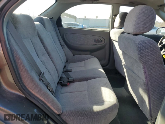 2003 Kia Spectra z VIN KNAFB121335277388, wystawiony jako Copart lot #46756185 z przebiegiem 151 235 mil mil oraz Szkoda całkowita • Salvage title. Historia ofert i sprzedaży dostępna na DreamBid. Obrazek 11.